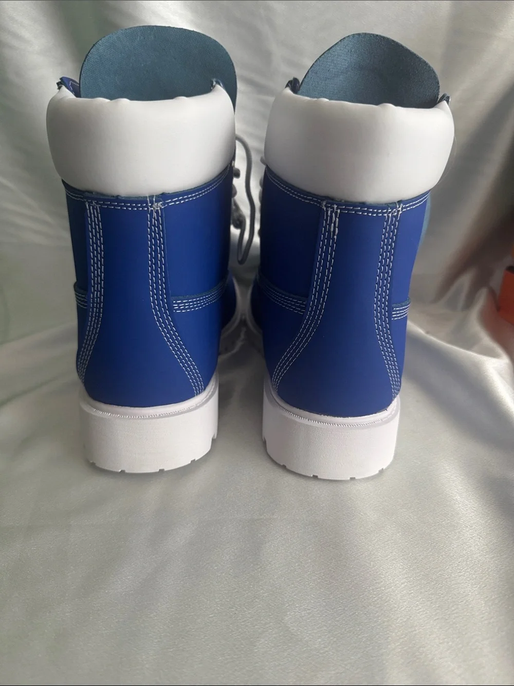New! Timberland Premium 6-Inch boots featuring a vibrant blue nubuck upper.